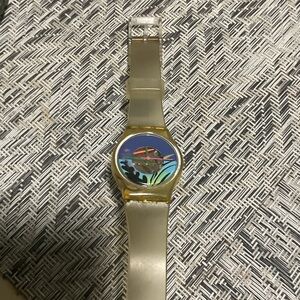 Swatch Gold and Black Artistic Smartwatch